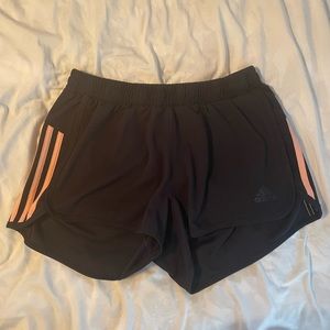 Adidas womens climalite black athletic shorts with peach stripes
